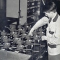 A Woodward worker pressure testing propeller governors manufactured for the Hamilton Standard Company's exclusive contract during World War two.
